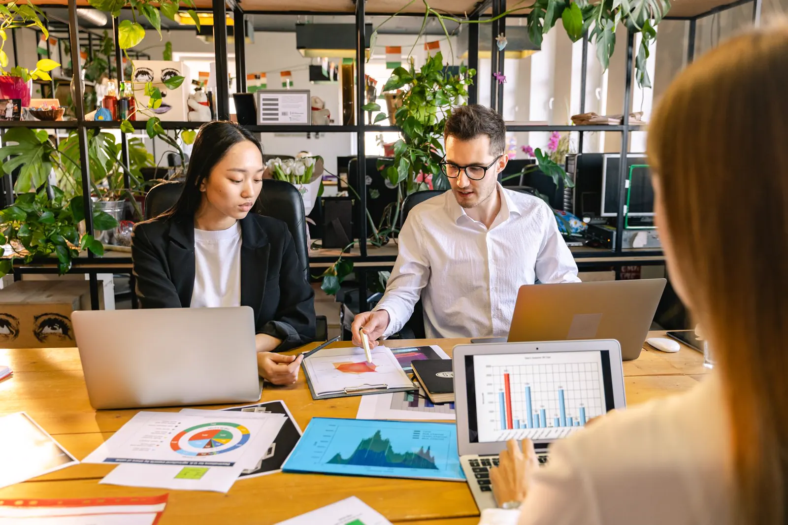 Business team reviewing plans together