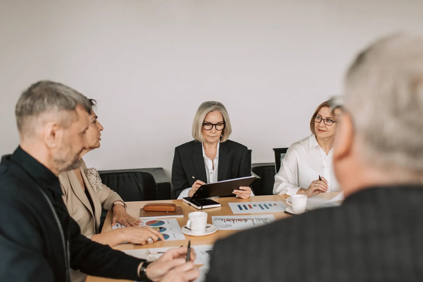 business professionals reviewing information together